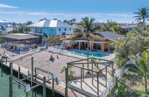 Mid Island Casa | 5535 Casa de Lujo- Heated Pool with Water Views home