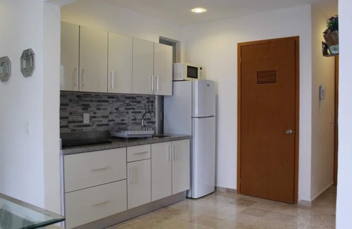 Centro Condominio | 5a Coral Suites