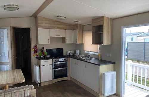 Felixstowe Otro | 6 Berth Caravan With Side Decking At Suffolk Sands Holiday Park Ref 45054C