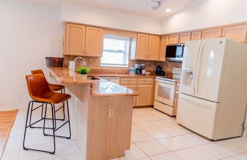 Naples Park Casa | 690 Paradise Shores Oasis | New Heated Pool & Spa