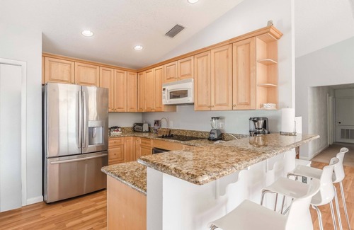 Edgewood Villa | 7BR Lakefront Duplex w/ Pool, Sauna & Hot Tub!