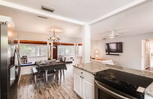 Edgewood Villa | 7BR Lakefront Duplex w/ Pool, Sauna & Hot Tub!
