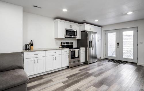 Saratoga Springs Casa | 8 Beds 2 Full Kitchens Fenced HUGE Yard & Parks!