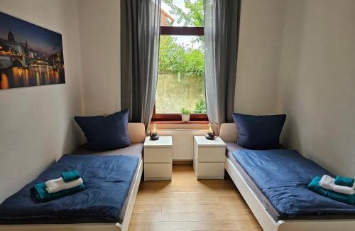 Heppens Apartamento | 95qm Erdgeschosswohnung im Villenviertel vollausgestattet mit Kamin, Balkon und Garten - WLAN gratis