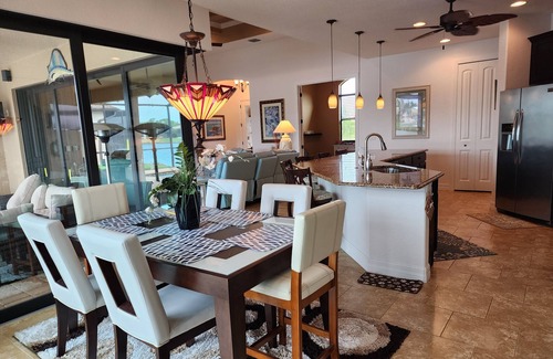 South Gulf Cove Casa | A 100+ reviews Family friendly home on canal with gulf access and heated pool!
