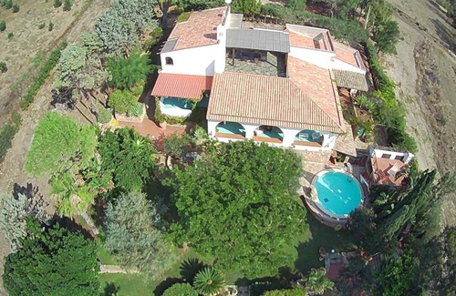 Porto Palo Villa | A balcony on the beach, swimming pool, lush parkland
