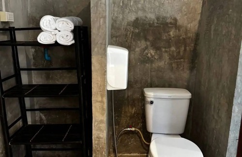 Luang Prabang Apartamento | A bedroom in a local area!