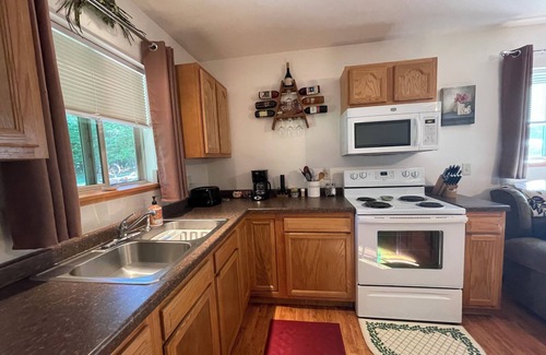 Stratford Cabina | A Cozy Cabin with Pond Views and Outdoor Fire Pit Near Eau Pleine Reservoir