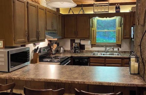Wolf Laurel Casa | A fabulous 6 person hot tub located outside on the deck!