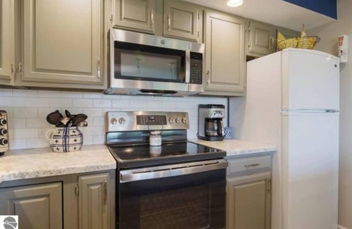 Kewadin Casa | 🍁 A-Ga-Ming 2BR Escape | Torch Lake Views + Golf ➠ 755