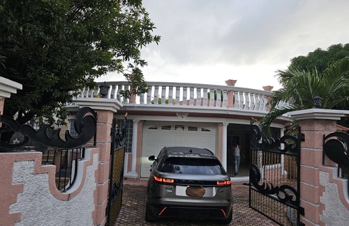 Molynes Gardens Casa | A Luxurious 2 Bedroom Vacation Home House Safe & Secured with grills remote gate