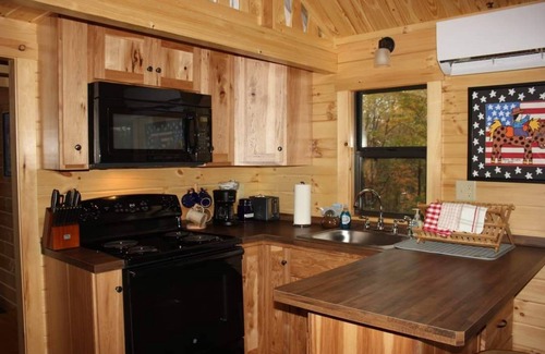 Brevard Cabina | A mile of riverfront and a mountaintop view in the Land of Waterfalls