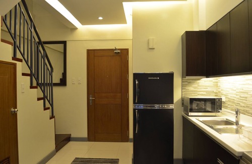 Legazpi Village Apartamento | Un nuevo y lujoso apartamento tipo loft de una habitación: 3 minutos a pie del centro comercial Greenbelt