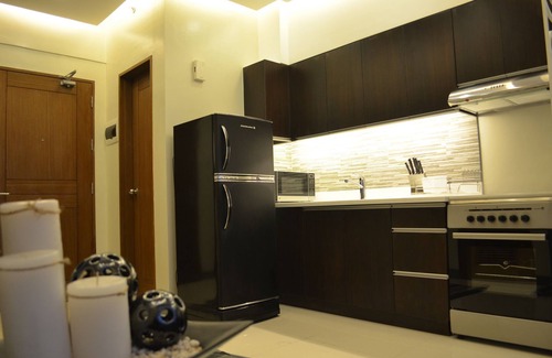 Legazpi Village Apartamento | Un nuevo y lujoso apartamento tipo loft de una habitación: 3 minutos a pie del centro comercial Greenbelt