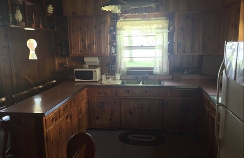 Pentwater Cabaña | A peaceful little lakefront house on the sunset side of Bass Lake!