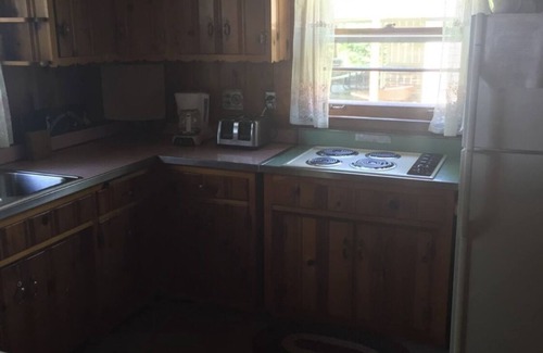 Pentwater Cabaña | A peaceful little lakefront house on the sunset side of Bass Lake!