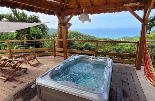 Cafeiere Apartamento | A Perle de vue - Appartement de charme Piscine & spa avec vues mer & forêt