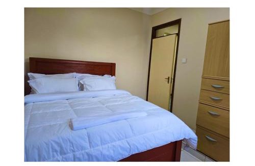 Arusha Casa | A private bedroom in a shared home in Arusha