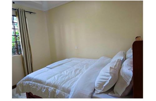 Arusha Casa | A private bedroom in a shared home in Arusha