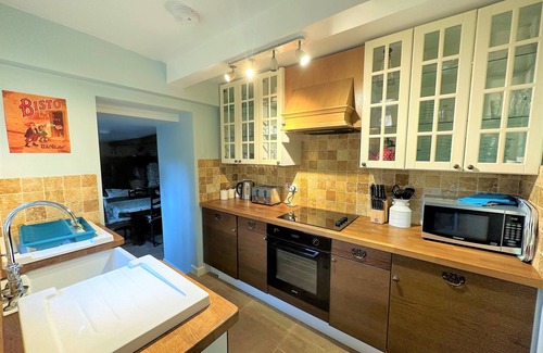 Lower Slaughter Cabaña | Una pintoresca cabaña de piedra independiente catalogada de grado 11 en Lower Slaughter con estacionamiento.