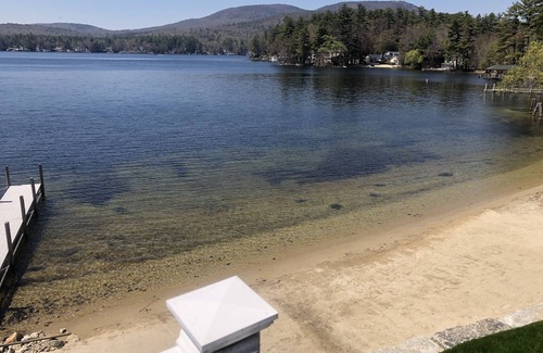 Alton Bay Casa | A quiet cove, the sunset and a sandy beach, on Lake Winnipesaukee