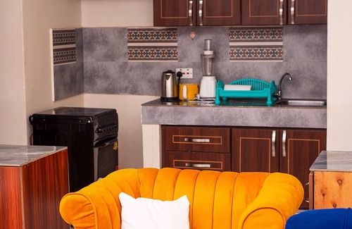 Bukoto Apartamento | A quiet one bedroom set with small gym and swimming pool.