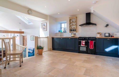 Tal-y-Cafn Casa | Un granero recientemente convertido que se encuentra muy por encima del hermoso valle de Conwy.
