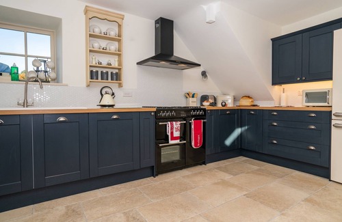 Tal-y-Cafn Casa | Un granero recientemente convertido que se encuentra muy por encima del hermoso valle de Conwy.