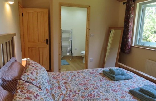 Dulverton Cabina | A secluded log cabin lodge with stunning views.