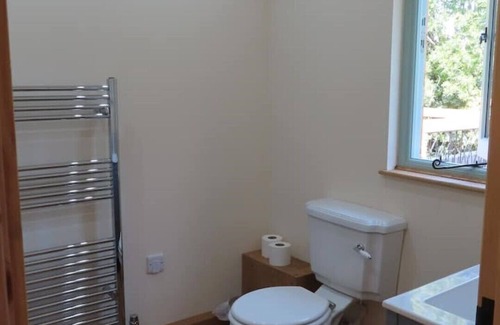 Dulverton Cabina | A secluded log cabin lodge with stunning views.