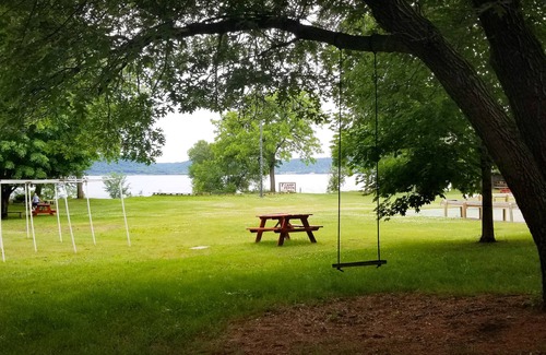 Pepin County Cabina | A summer camp cabin with attached bath and lounge area