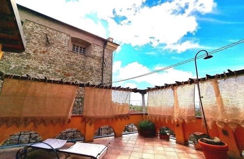 Giucano Apartamento | Una fortaleza del siglo XIII a un paso de las Cinque Terre.