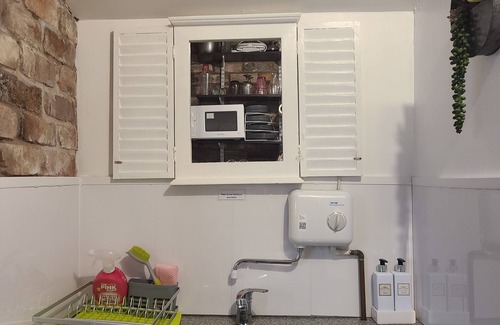 Prestatyn Cabaña | A Victorian laundry now a little (25'x8') dog-friendly let 5mins to town & beach