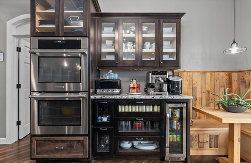 Forest Junction Casa | A warm & inviting modern retreat featuring on-site local brews & a home theater.