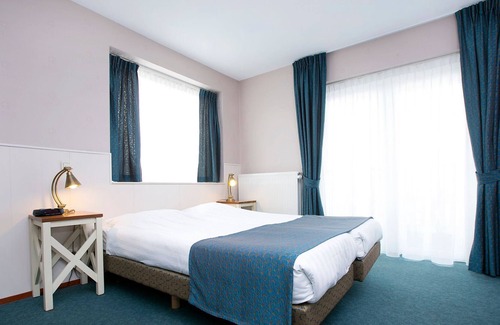 Municipality of Hellevoetsluis Apartamento | Adjusted hotel room with a balcony, near the beach