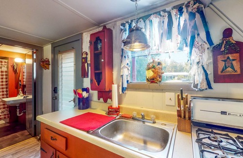 Bushnell Cabina | Adorable A-Frame with Riverfront Yard, Fishing Pier, & Firepit