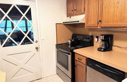 Hawley Cabina | Adorable Gingerbread Style cabin in gorgeous amenity filled lake/pool community