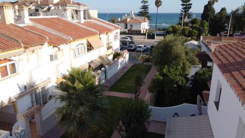 Torre de Benagalbon Casa | Adosado frente a la Playa