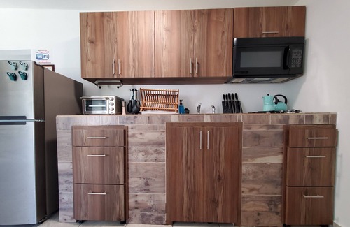Aguadilla Apartamento | Aguadilla Sunset Apt with electricity water AC WIFI 8 minute walk from Crashboat