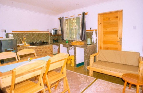 Iringa Apartamento | Aika Sunrise: Treetops Apartment
