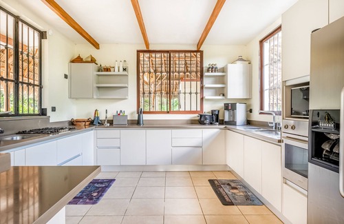 Coco Casa | Airy oasis with a grand outdoor space, private pool, & shared tennis court