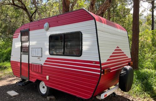Crescent Head Otro | Alice & Elvis, Crescent Head, Retro Caravans with Deck, Bathroom & Outdoor Bath in a Bush Setting near the Beach