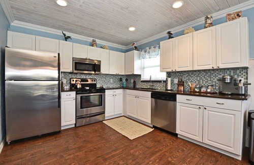New Smyrna Beach Casa | "All Decked Out NSB" Ocean Views, Private Fenced Yard, BBQ, Bikes, Beach toys