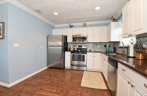 New Smyrna Beach Casa | "All Decked Out NSB" Ocean Views, Private Fenced Yard, BBQ, Bikes, Beach toys