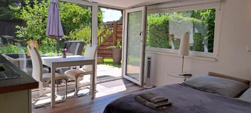 Vennhausen Apartamento | All-in-One Apartment mit eigener Sonnenterrasse im Garten