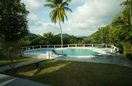 Choc Casa | Almarlene House, spacious home sea view, large pool, patios, cot, cook