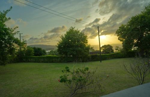 Choc Casa | Almarlene House, spacious home sea view, large pool, patios, cot, cook