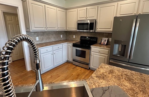 West Omaha Casa | Alpine Inspired 4 Bedroom Home! 5 Beds