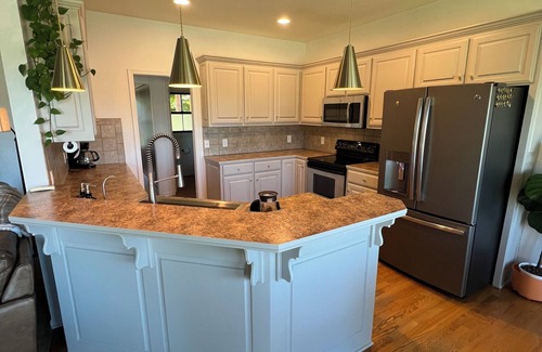 West Omaha Casa | Alpine Inspired 4 Bedroom Home! 5 Beds