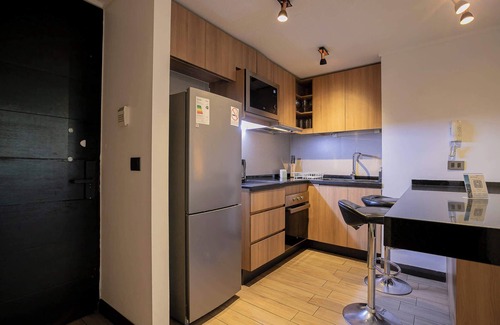 Las Condes Apartamento | Alto Familiar: 2 Dorm. con Piscina y BBQ Premium